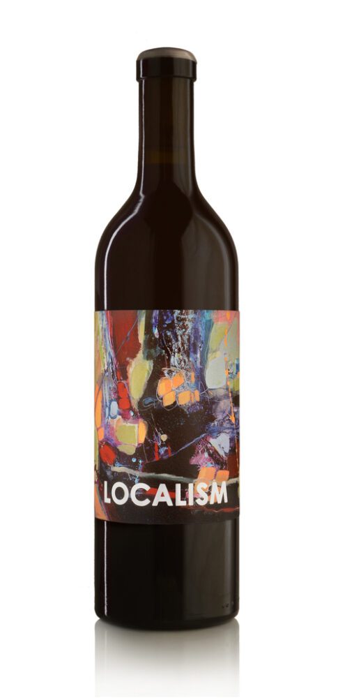 Wine bottle labeled "Localism"